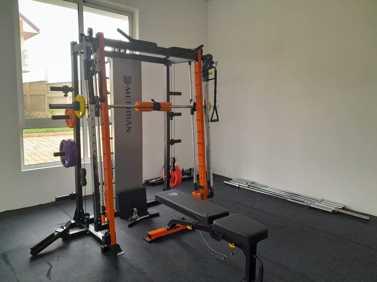 A stylish workout space highlighted with bold orange and red tones, designed to boost energy, enhance movement, and inspire a powerful exercise atmosphere.