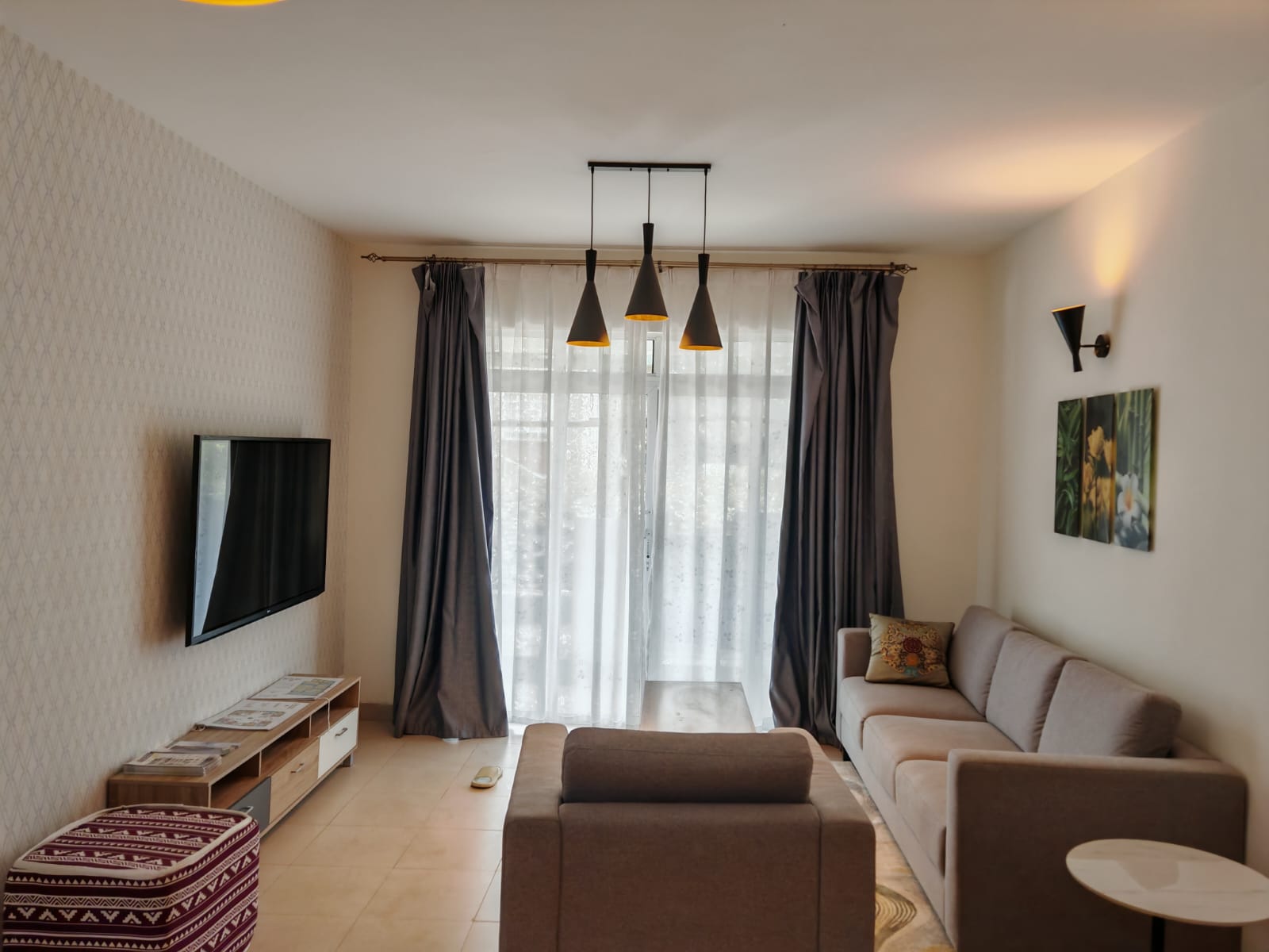 Modern gated community apartments for sale in Ongata Rongai, featuring spacious 2 and 3-bedroom units with cabro-paved driveways, natural lighting, and secure living environment.