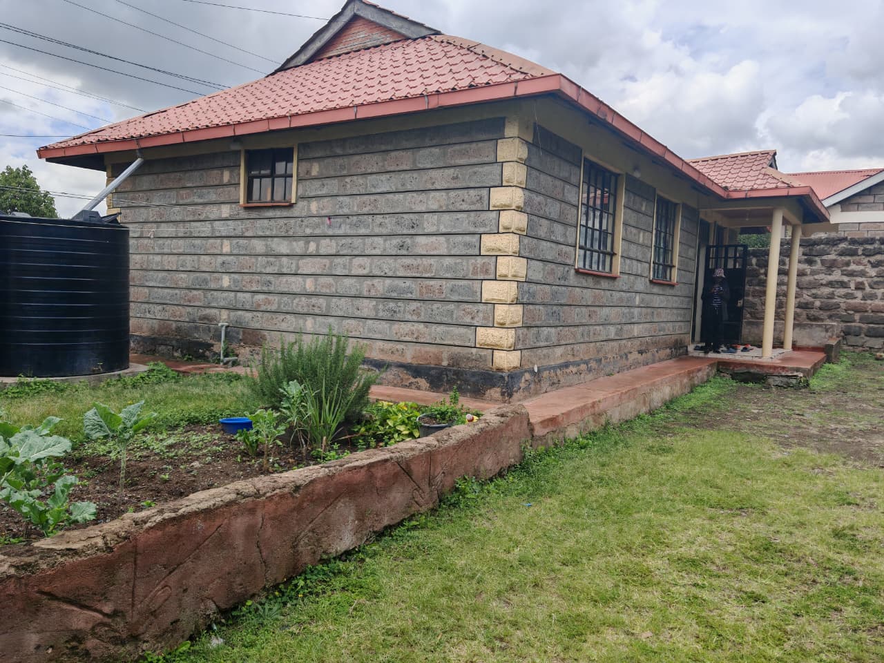Charming 3-bedroom master ensuite bungalow for sale in Ongata Rongai, featuring a spacious compound, outdoor facilities, and a peaceful, family-friendly environment.