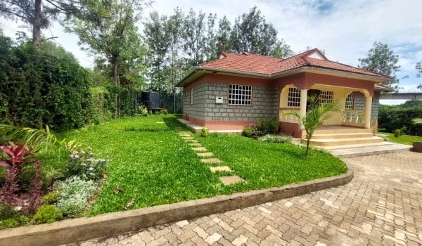 A luxurious 4-bedroom bungalow for sale in Ongata Rongai, featuring modern finishes, a landscaped garden, and serene, family-friendly surroundings.