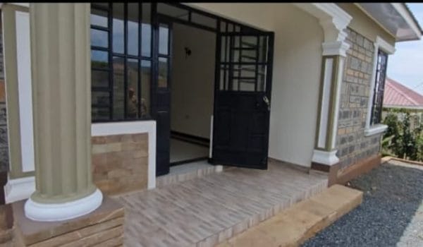 Beautiful 3-bedroom bungalow for sale in Matasia at KSh 7.5M, located in a secure gated community with spacious rooms, modern fitted kitchen, stylish wardrobes, perimeter wall, ample parking, and close to the tarmac road.