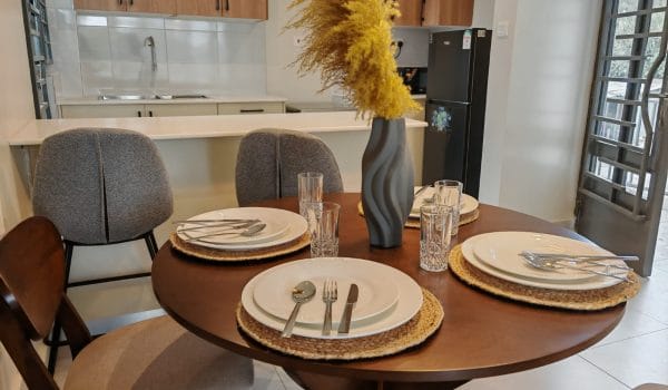 Modern 1- and 2-bedroom apartments with open-plan layouts, sleek kitchens, and bright interiors, offering comfort and security in a serene urban setting.